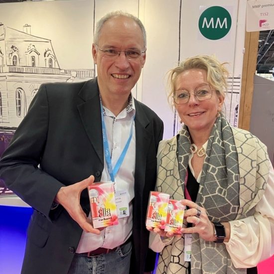 L'Oréal Project Engineer Thierry Ponton and Adélaïde Soldera, Commercial, Sales, Marketing and Development Director for MMP Beauty & Personal Care show off Ella Ella, the new fragrance by Cacharel at Paris Packaging Week 2025.